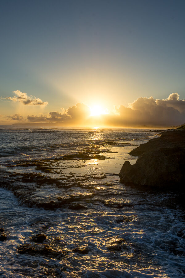 Sunrise Reflecting Over The Ocean